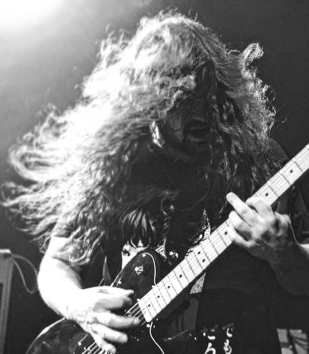 Brian headbanging on stage (black & white)