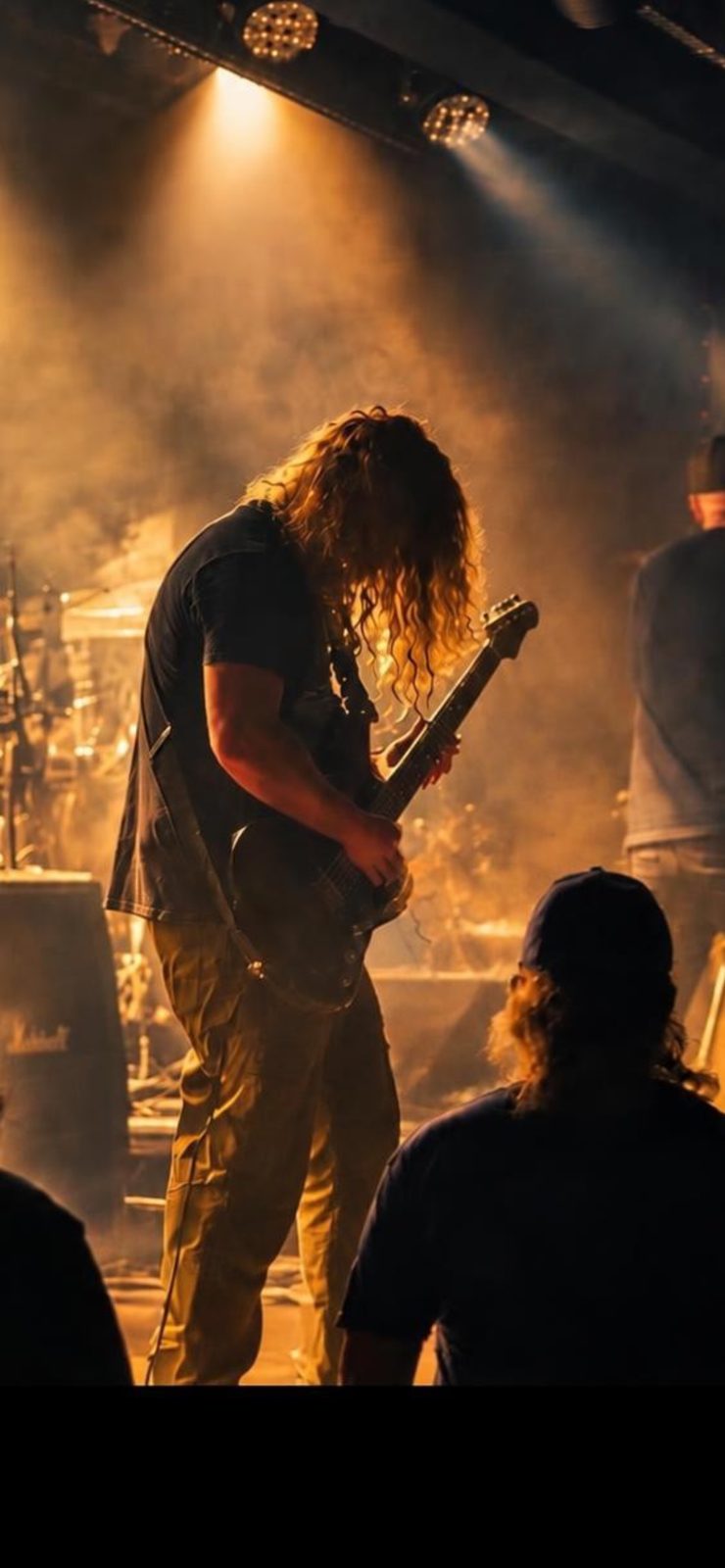 Brian (WhiplashCordsB) on stage with guitar